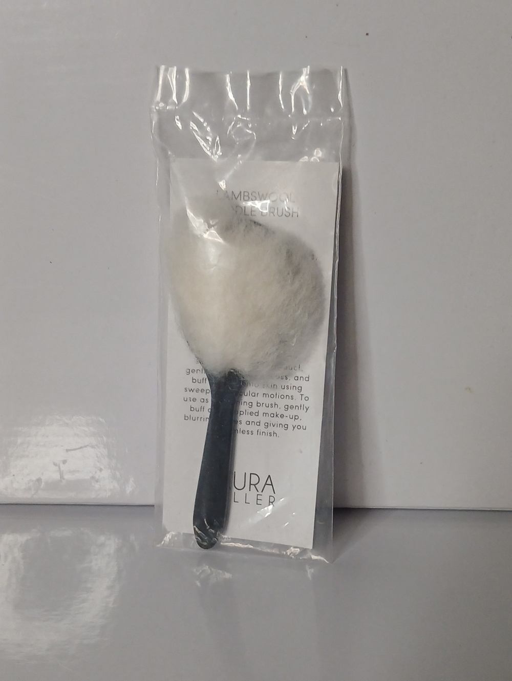 New Sealed Packaging  Laura Geller Black and White Lambswool Paddle Makeup Brush